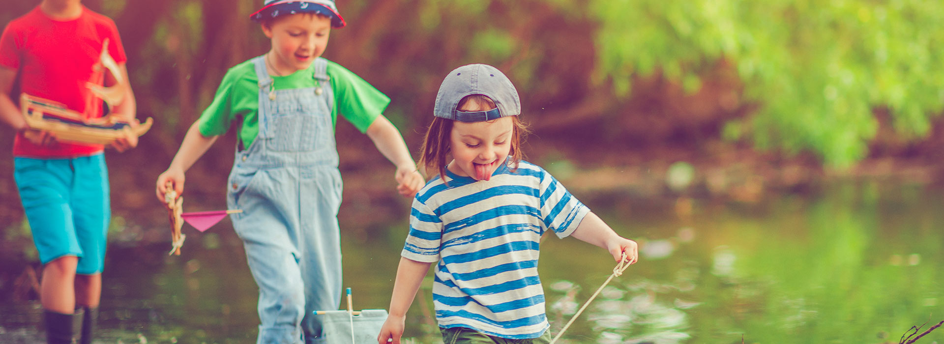 Kids walking through water