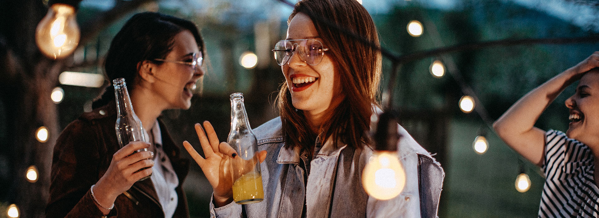 Happy teen holding a drink